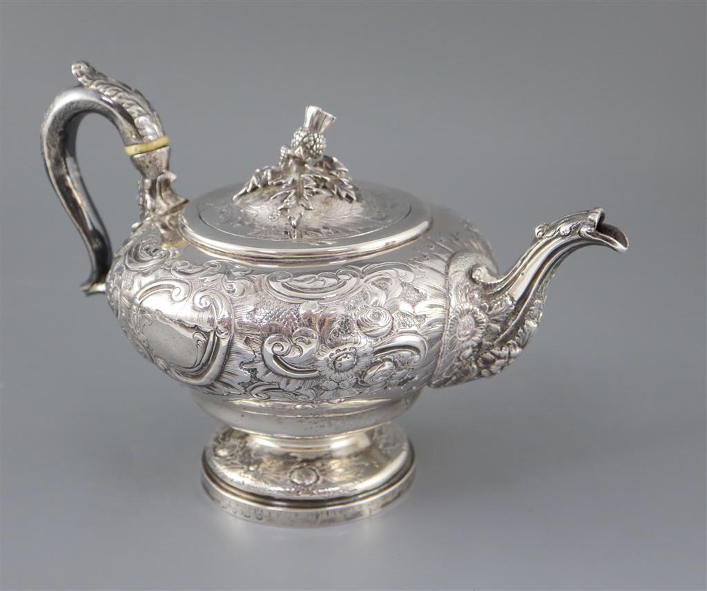 A George IV? silver pedestal teapot with thistle finial, marks rubbed,